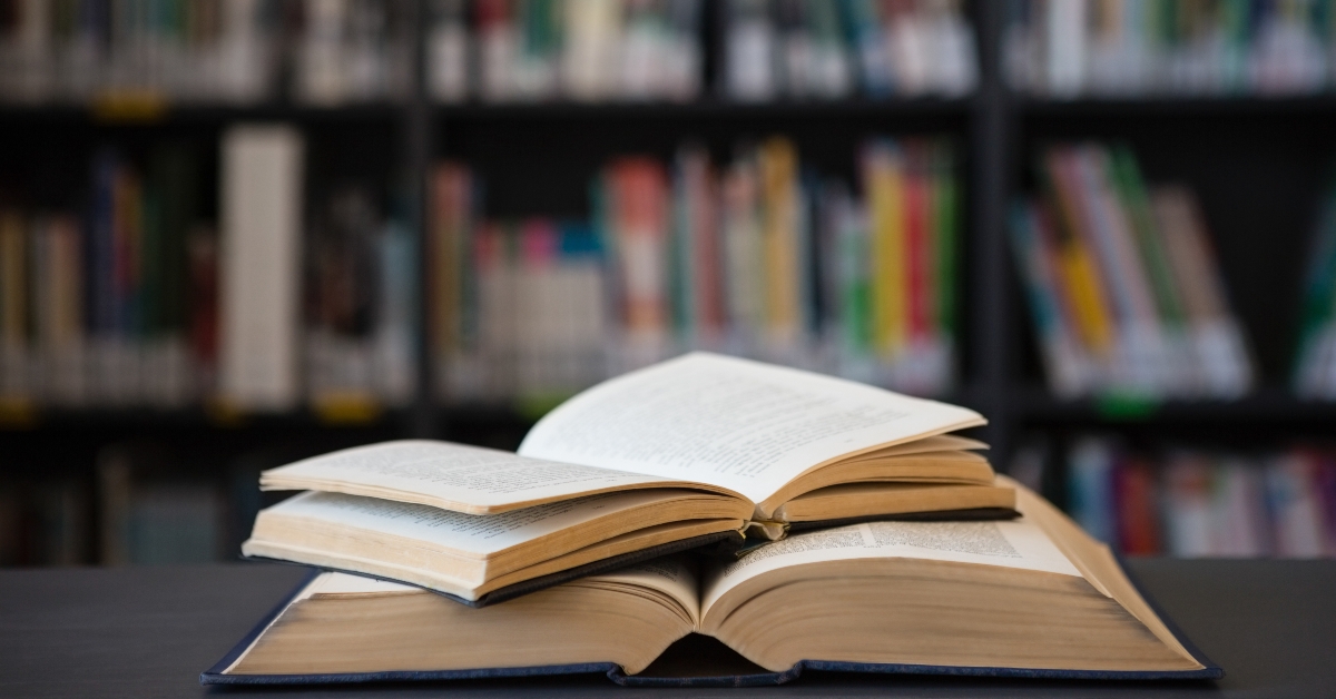 Close up of open books on table