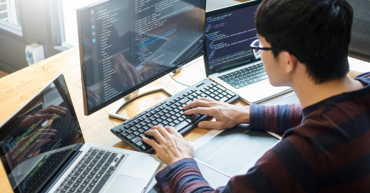 programmer working on on desktop