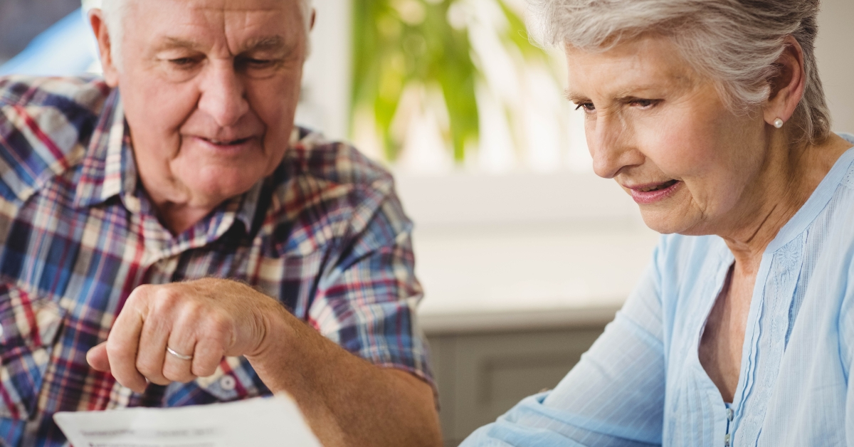 senior couple discussing their bills 