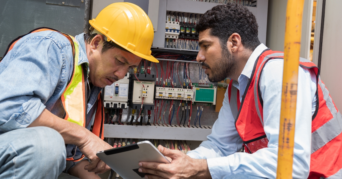 electrician with digital tablet