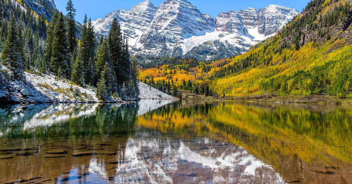 wide angle autumn midday view of snow