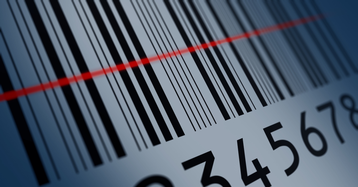 Bar code closeup with red scanning laser