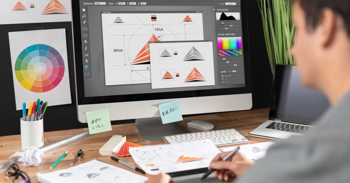 graphic designer drawing sketches logo