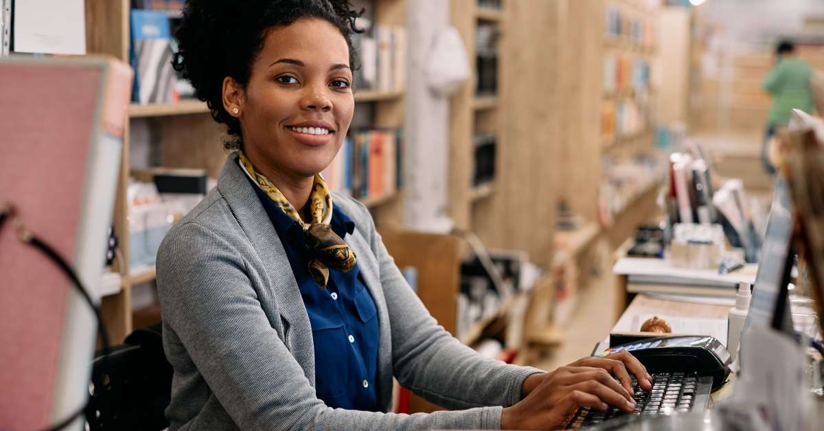 librarian works on computer