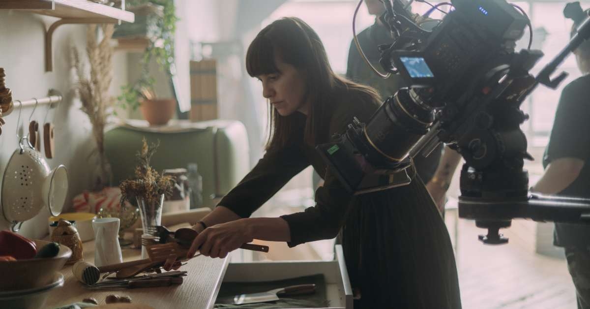 the artists work in building a frame 