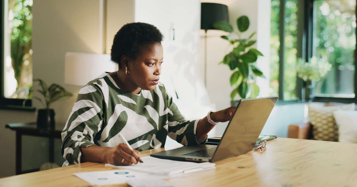 black woman with laptop
