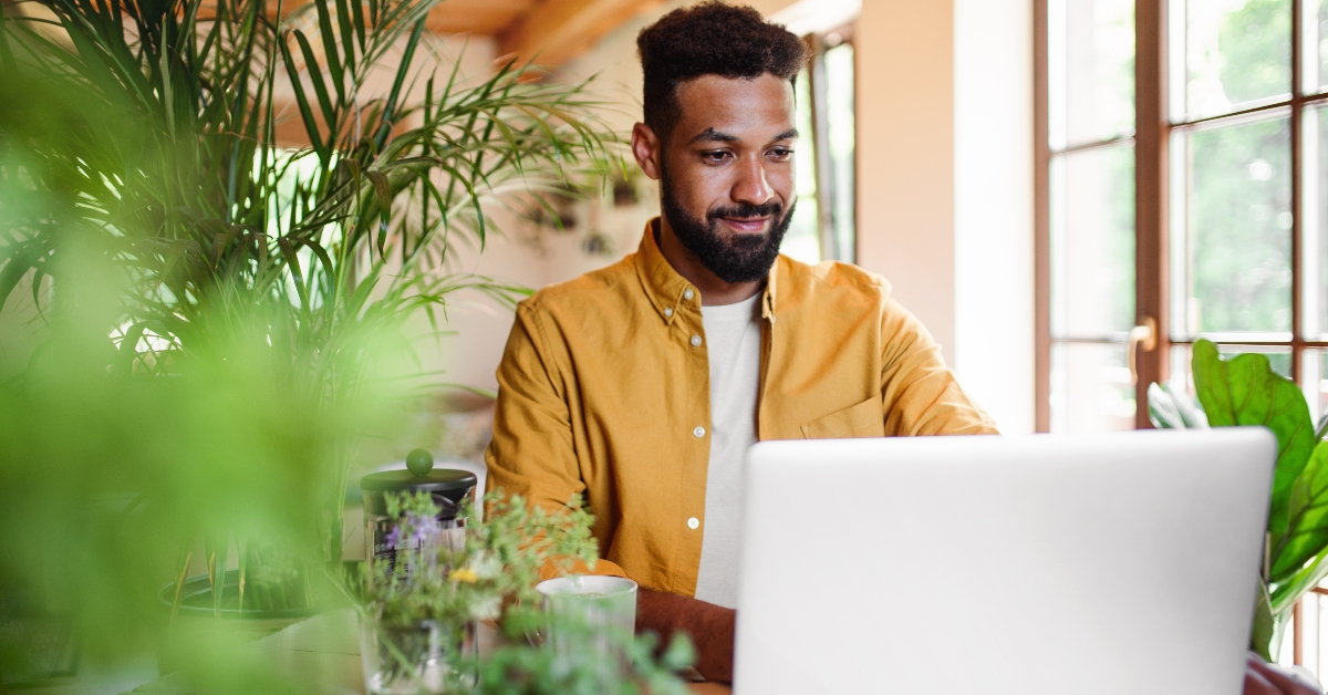 young man with laptop