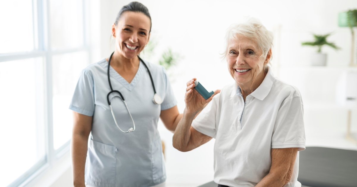 Elderly woman using inhaler for asthma