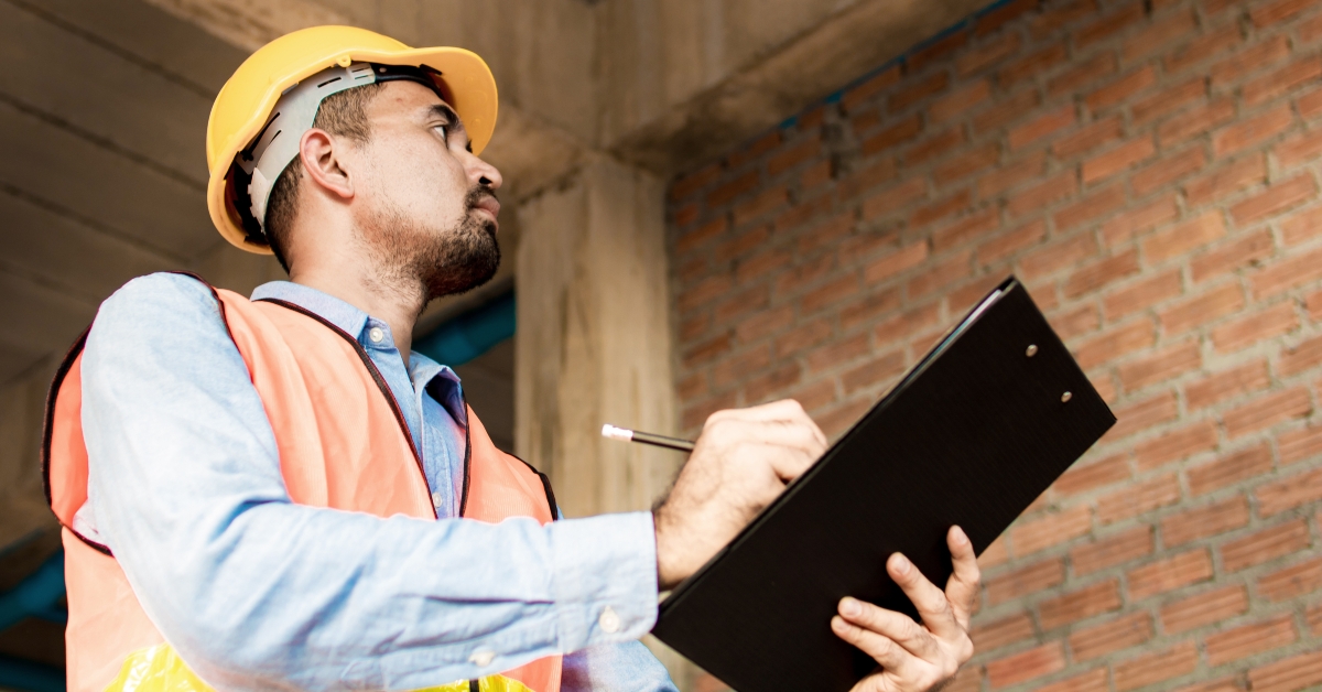 Engineer or inspector checking progressing work