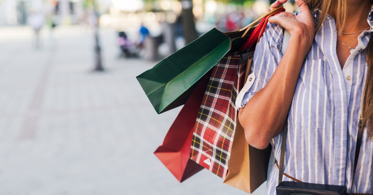 woman carrying shopping bags