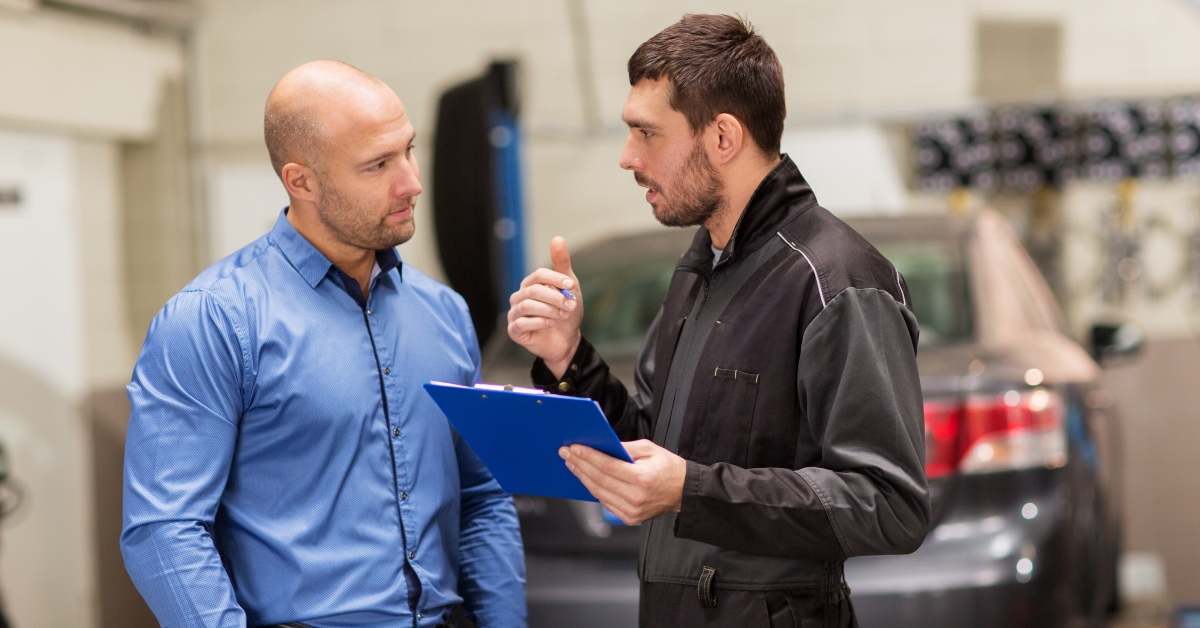 auto mechanic and customer