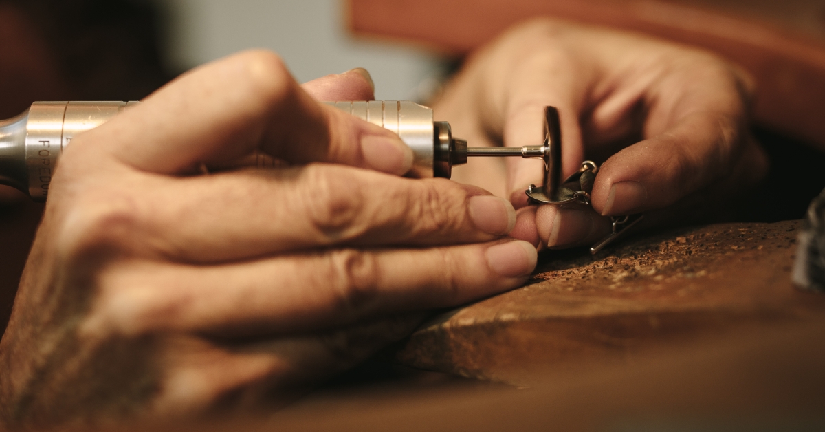 jeweler makes a piece of jewelry 