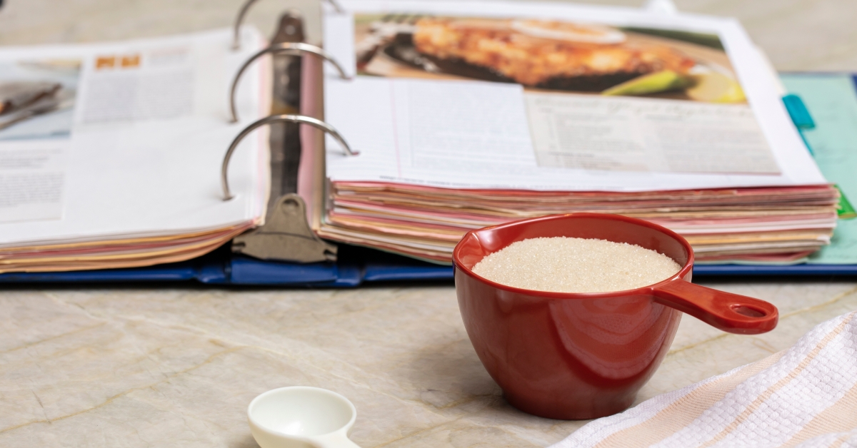 measuring utensils and recipe book