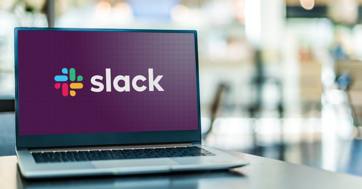 Laptop computer displaying logo of Slack