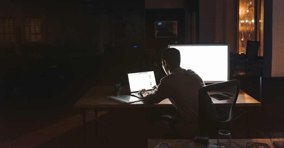 Businessman working overtime at his desk