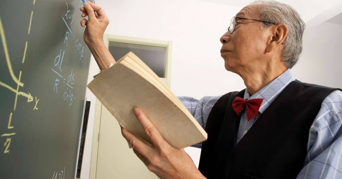 teacher holding book