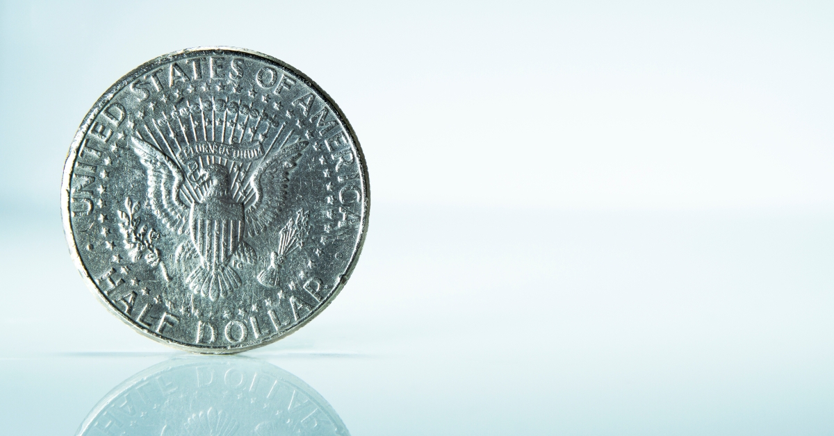 balancing half dollar coin 