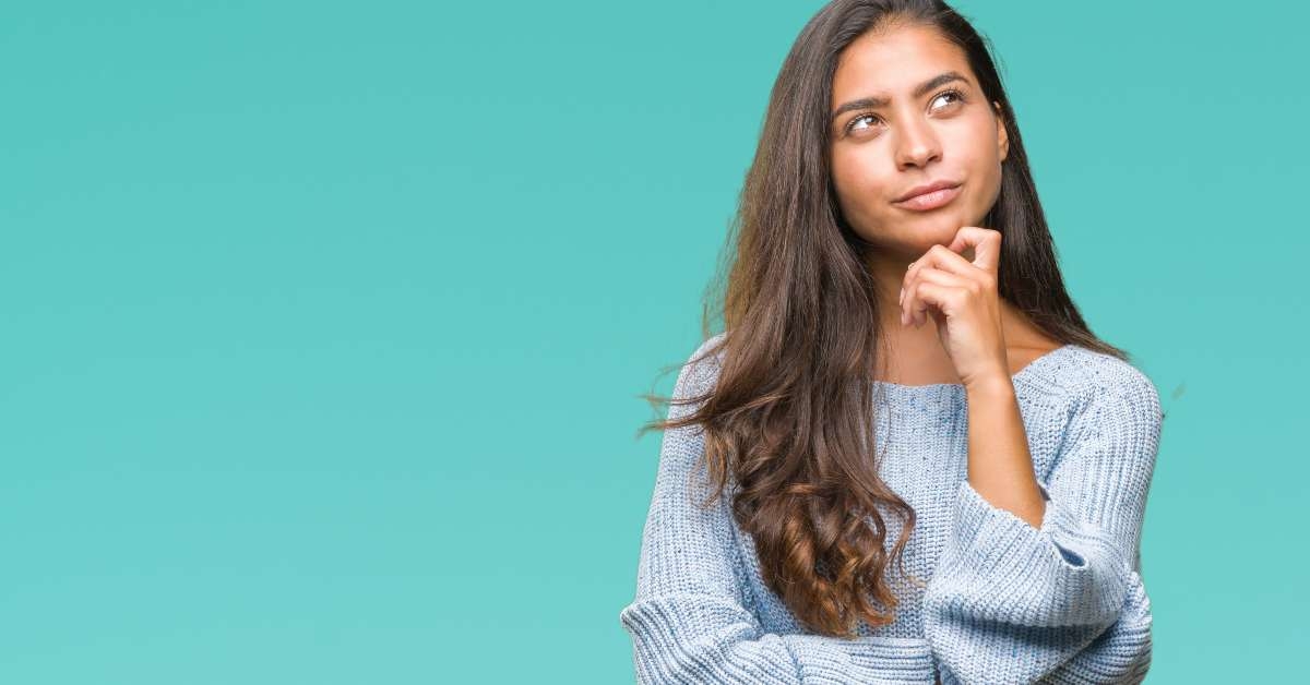 smiling with thoughtful face