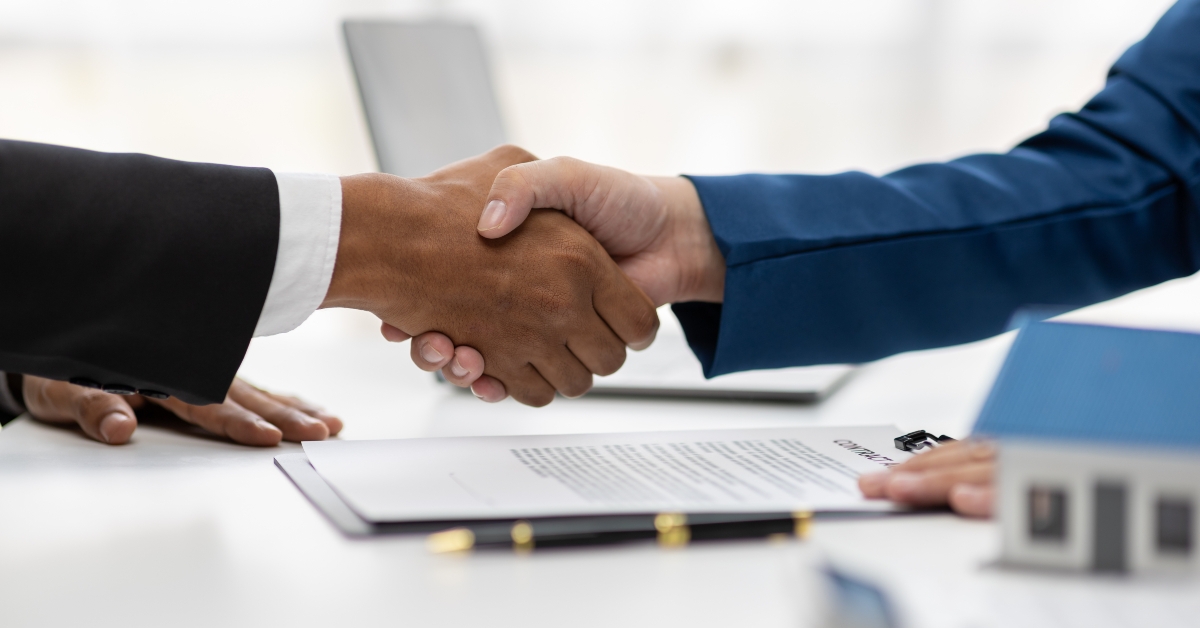 businessman shake hands with real estate agent