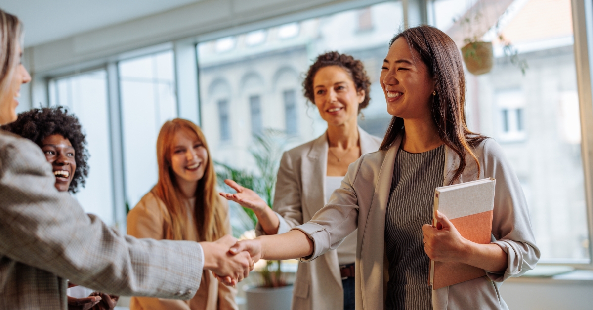new employee meeting her team at work