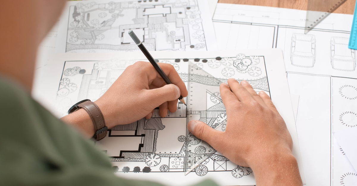 male landscape designer working in office 