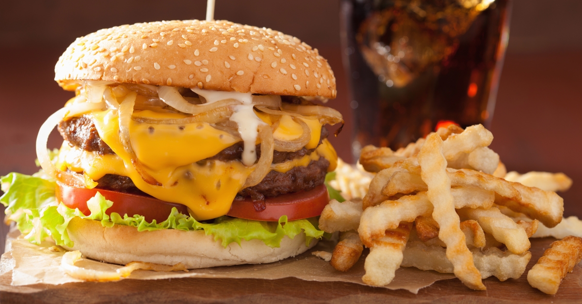 double cheeseburger with drinks