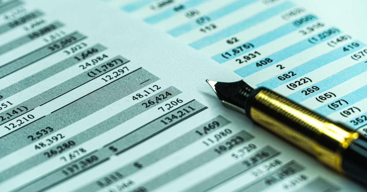 sheet of a financial report with fountain pen