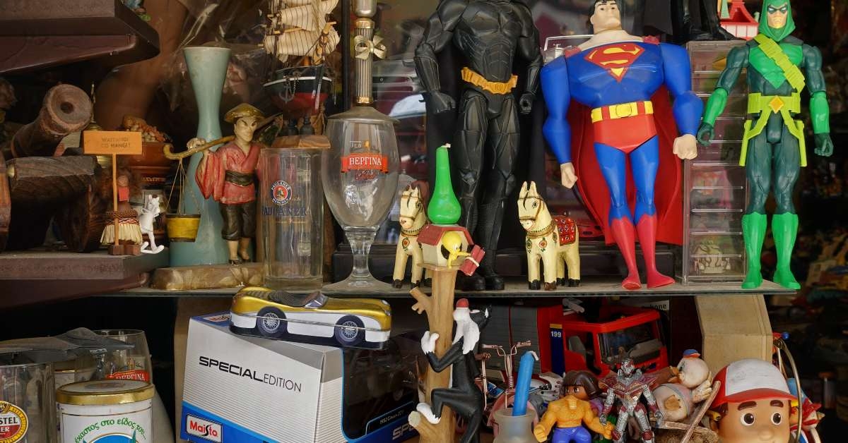superhero action figures at antiques store