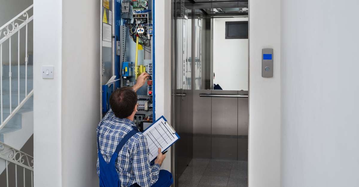 technician repairing elevator