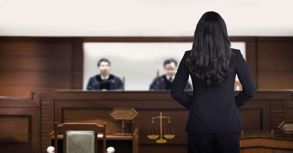 courtroom attastor talking to magistrate