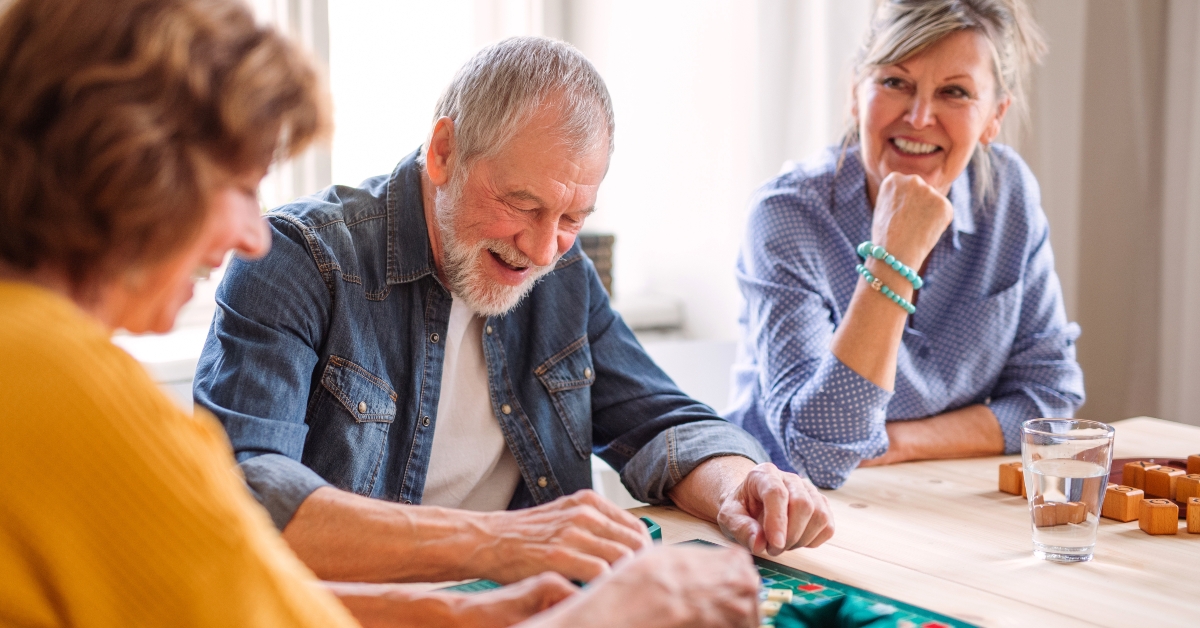 group of seniors playing board games