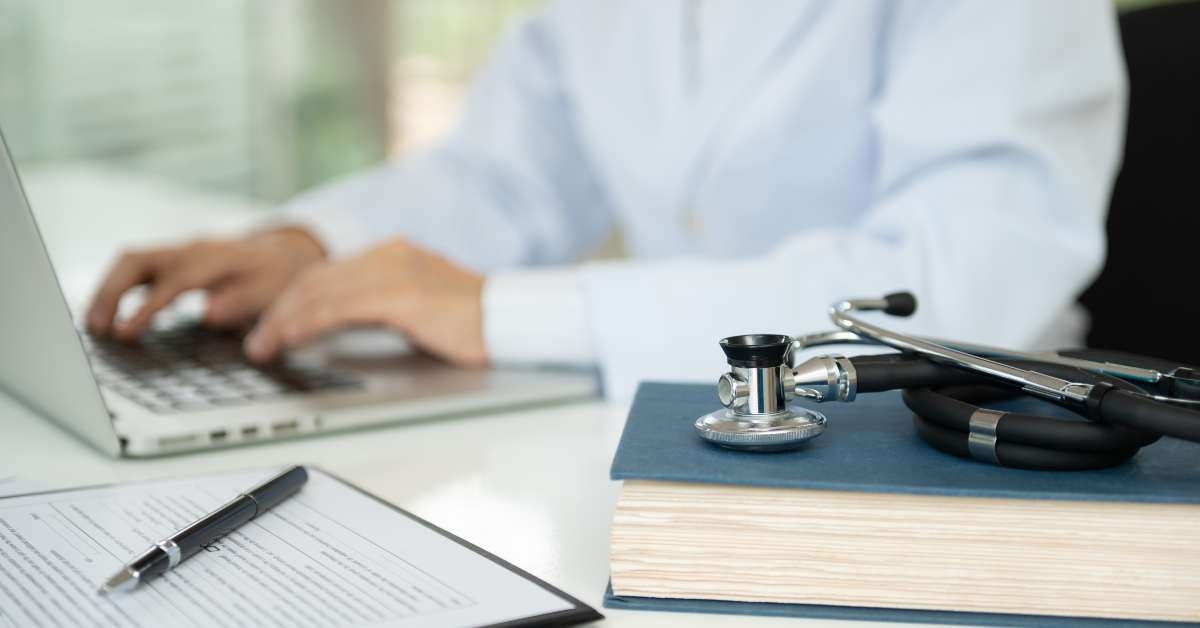 stethoscope on medical textbook