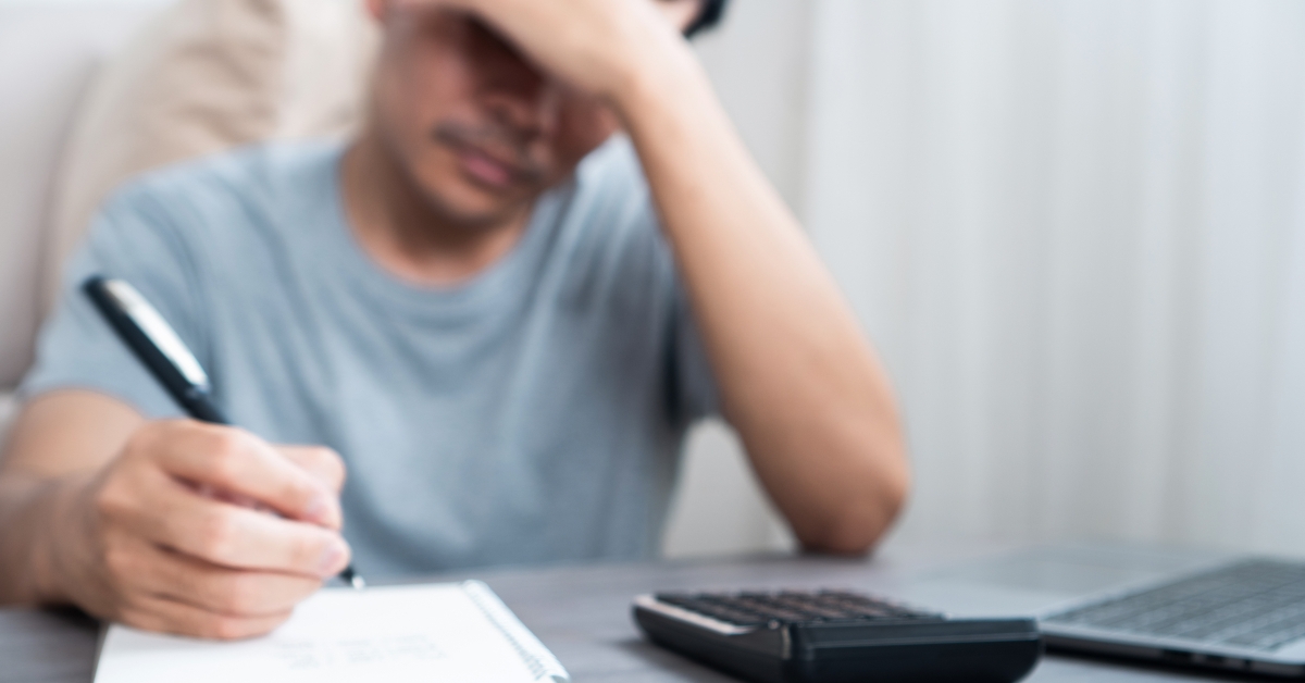 man feeling stressed and worried