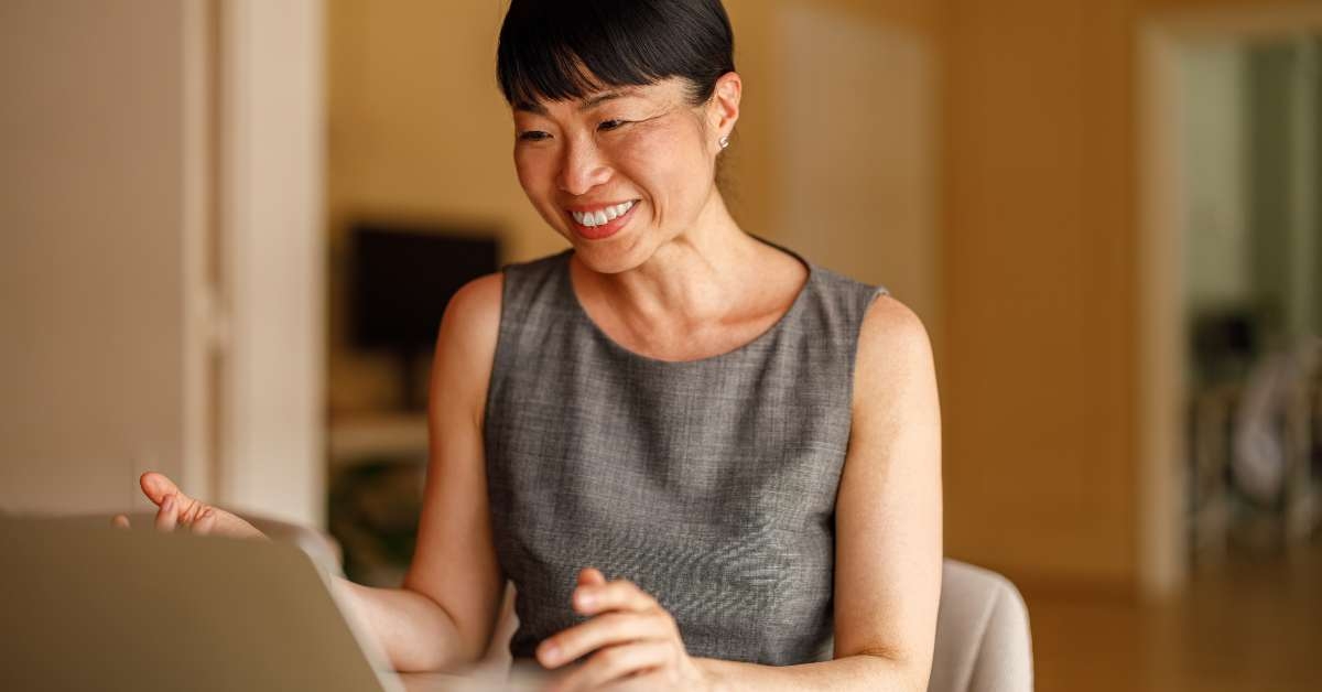businesswoman smiling and engaged in project planning