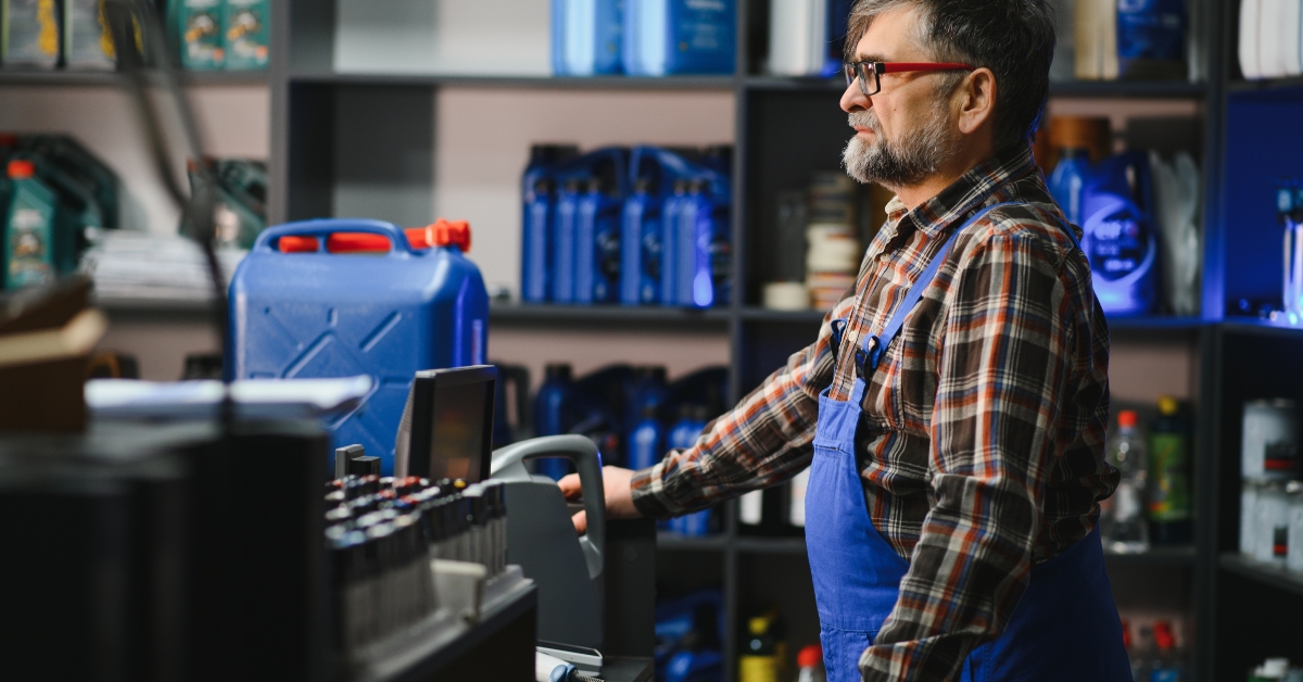 salesman working at the cash register