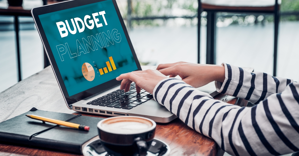woman doing budget planning on a laptop