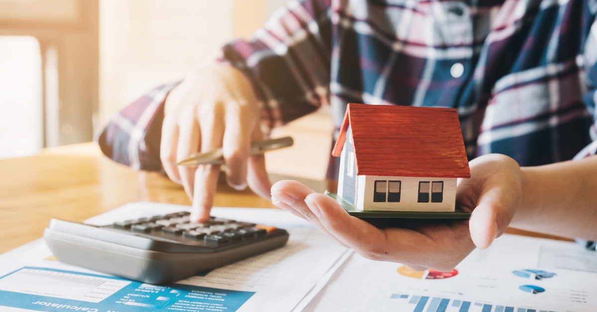 woman calculating budget before signing real estate project