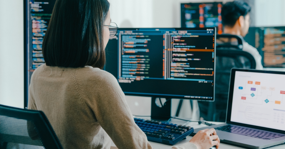 female freelancer sitting in front of computer