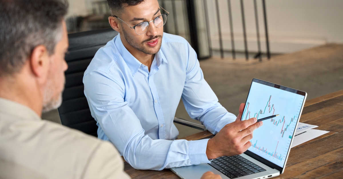 Financial advisor explaining invest stock market data