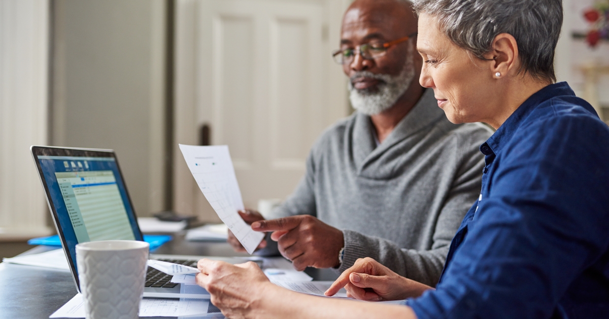 senior couple busy on a budget review