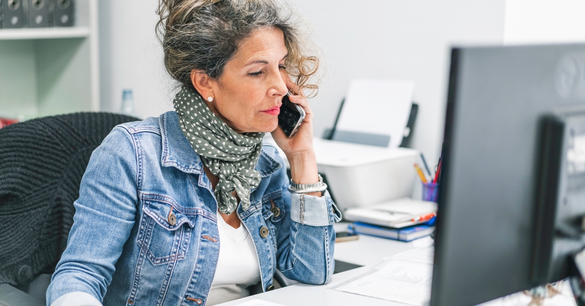 woman speaking at the phone