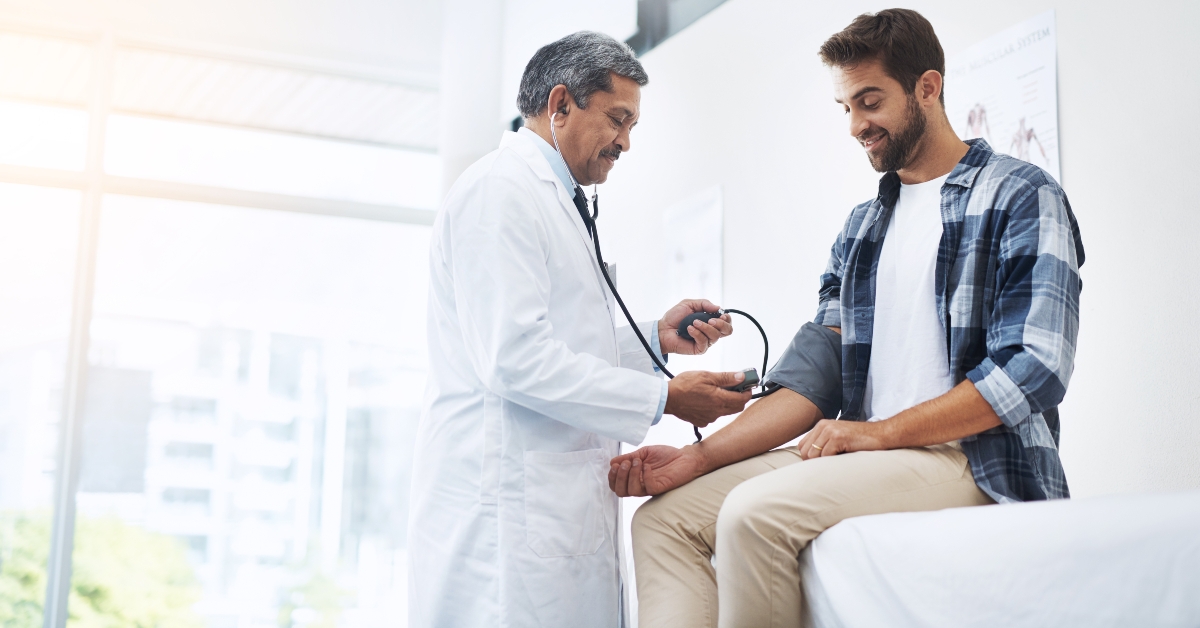 patient and doctor with blood pressure test