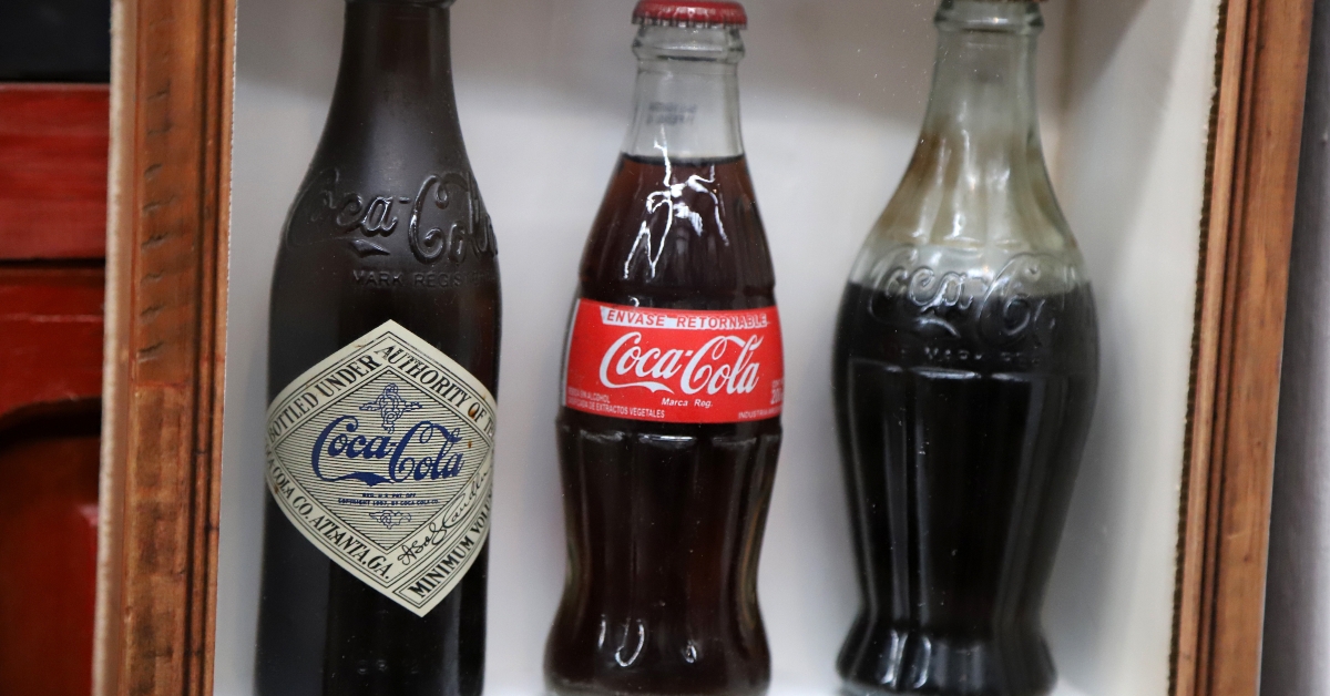Old Coca Cola bottles of different models
