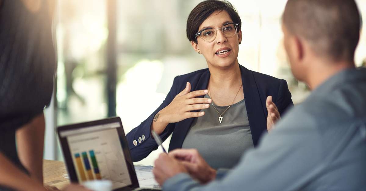 business woman in meeting with clients