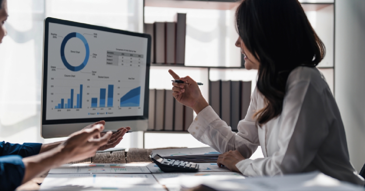 two business people discusing project