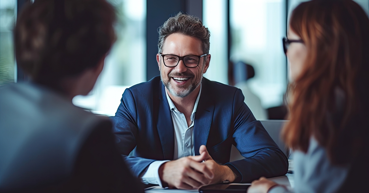 financial advisor meeting with clients