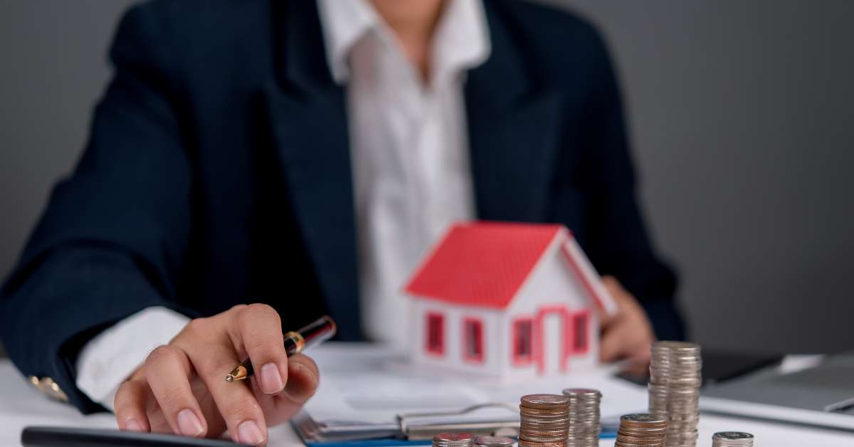 businessman calculating home loan