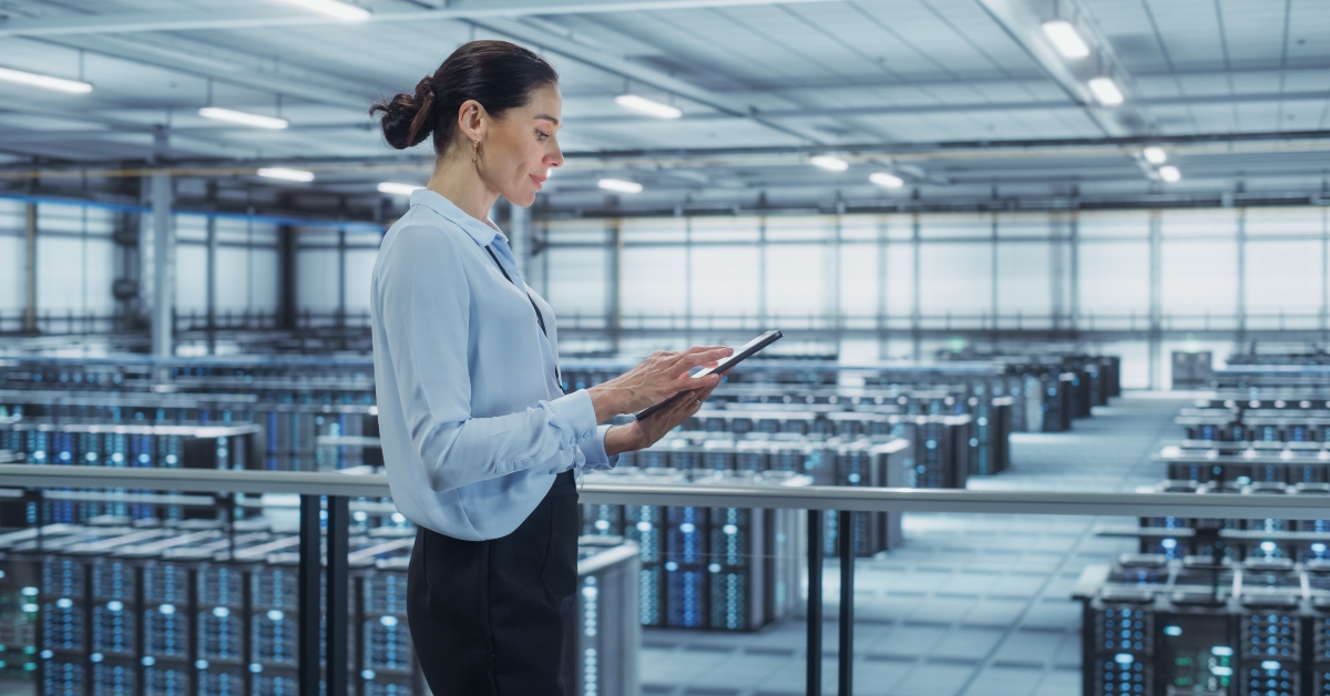 data center engineer using tablet at work