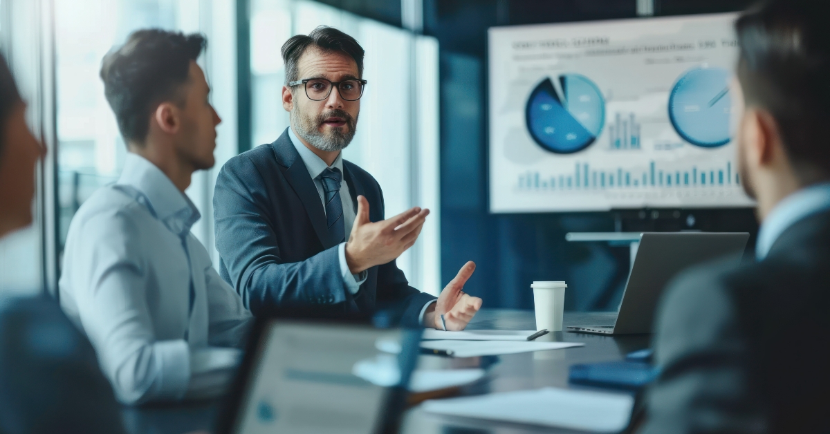 male actuary presenting actuarial findings