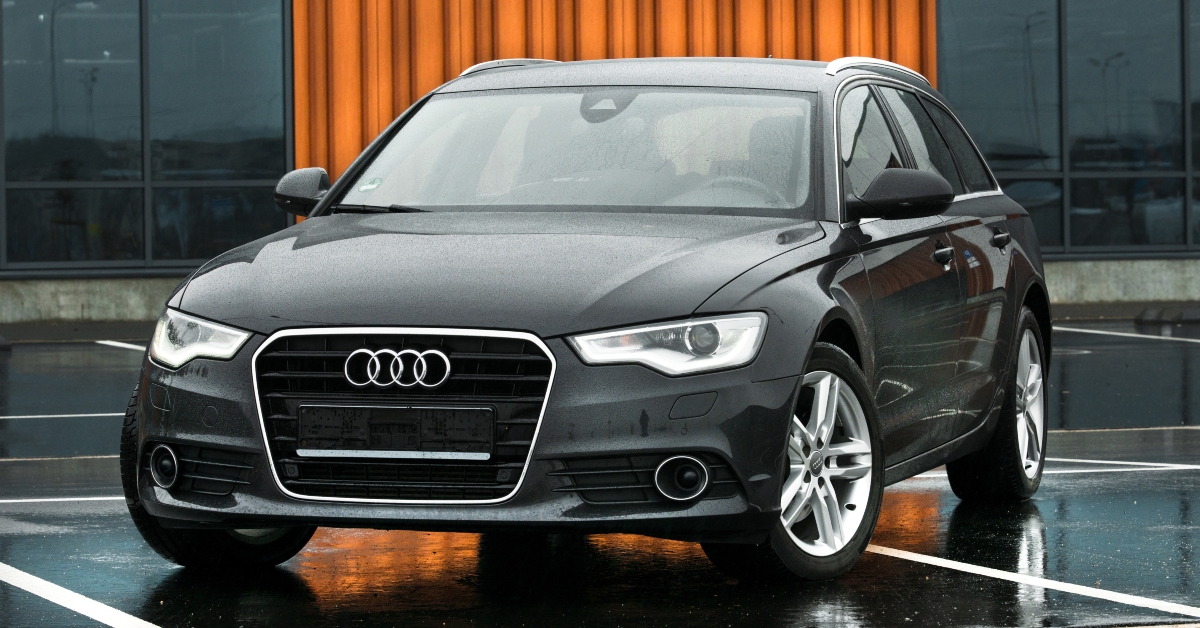 Car on parking place, near building